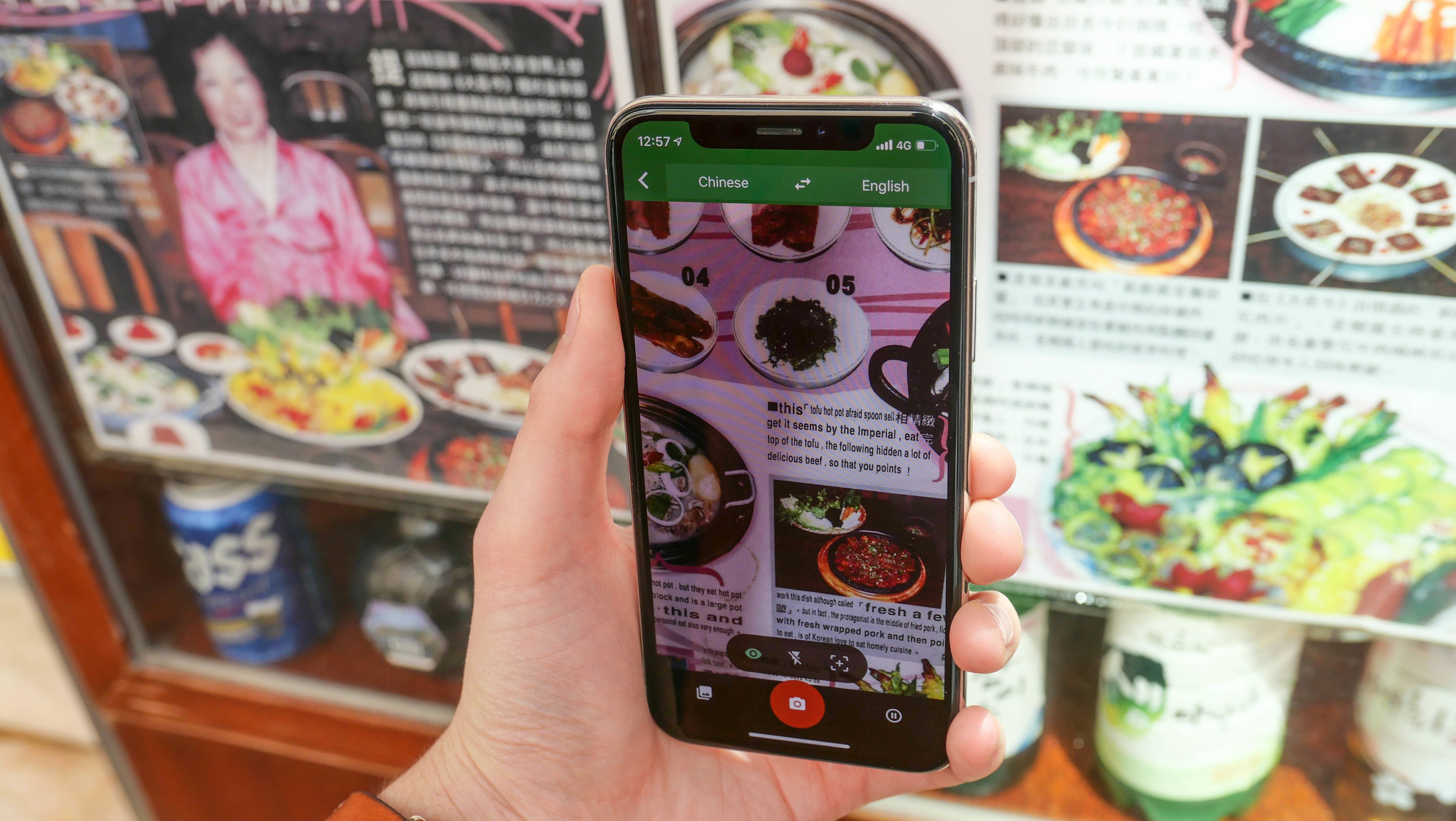 Photo of a smartphone all being used to translate a Chinese menu in Hong Kong