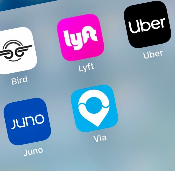 Try a competitor to one of the bigger ride-sharing companies such as Via or Juno, both of their apps pictured here.