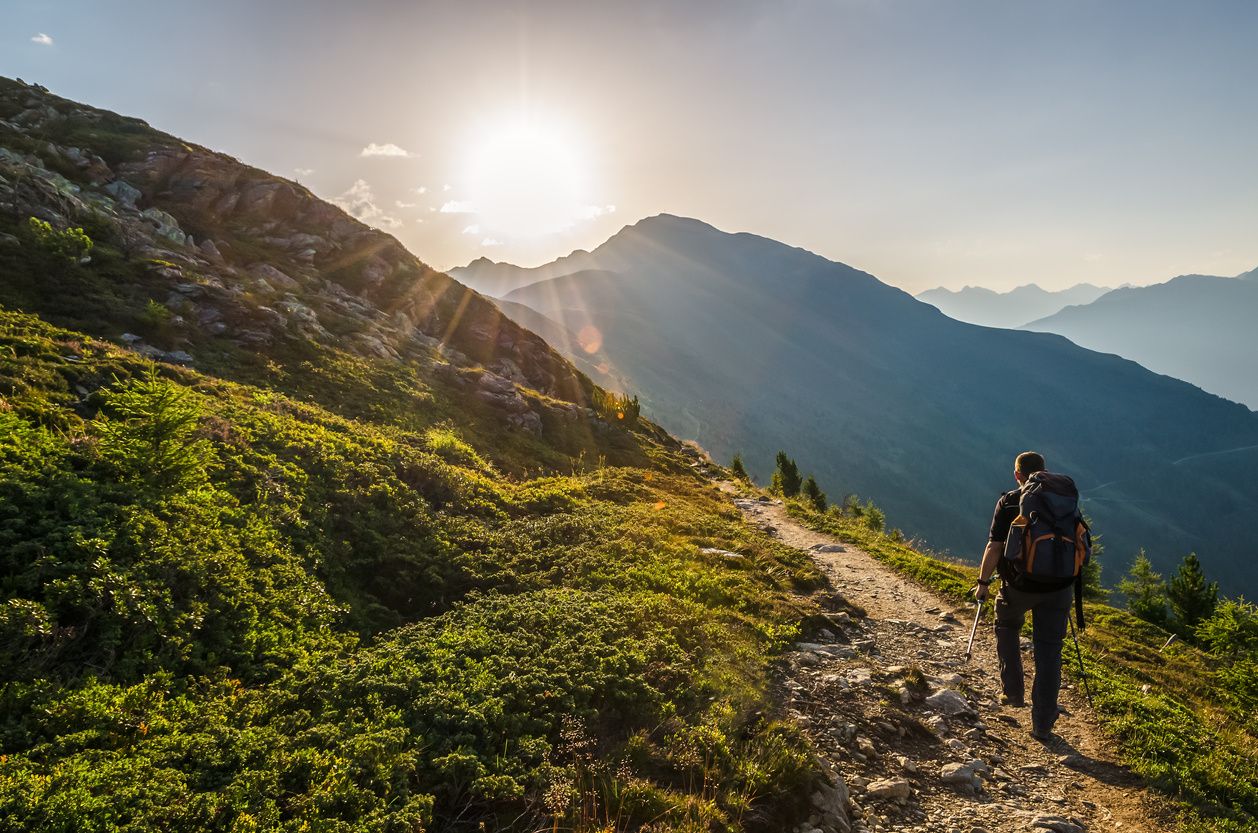 stock image of a man backpacking