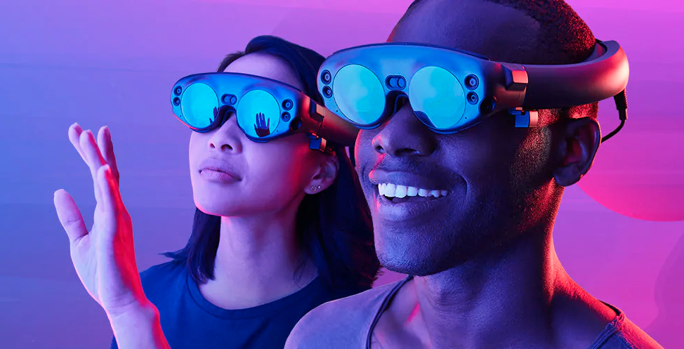 Image of two people using the Magic Leap augmented reality headset