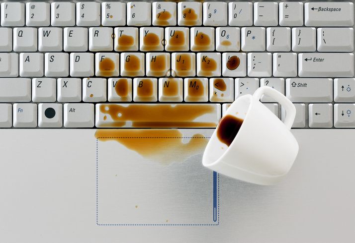 Coffee spilled across a laptop keyboard