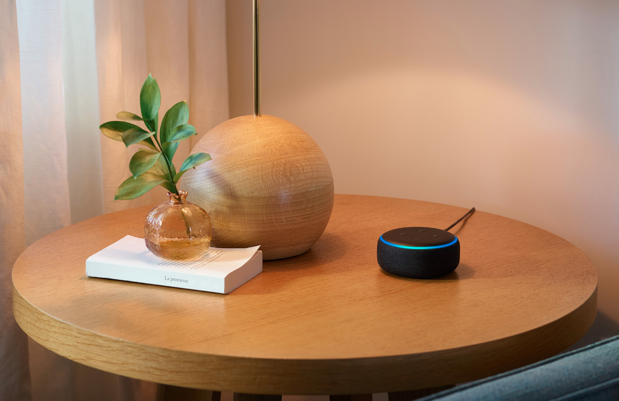 photo of an echo dot on a table