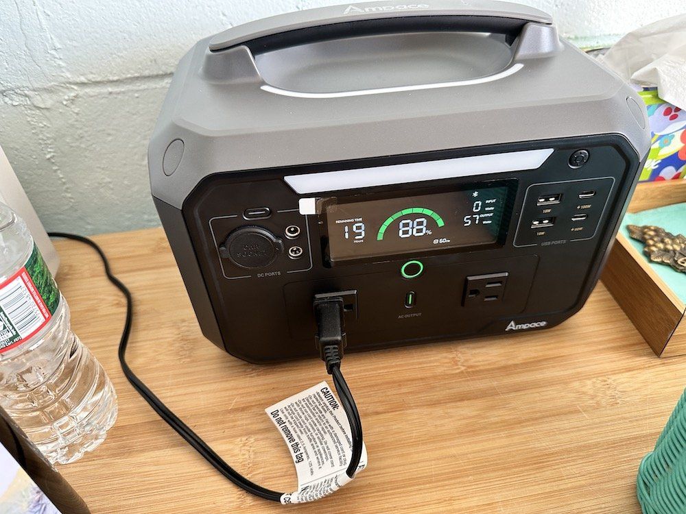 a photo of Ampace Andes 600 Pro Portable Power Station on a countertop