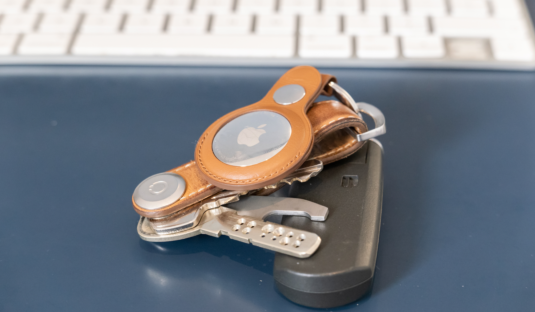 ​Apple AirTag in Apple's leather keyring accessory