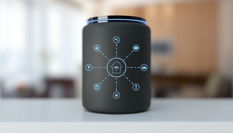 A smart speaker with images of a home, light bulb, lock and other icons