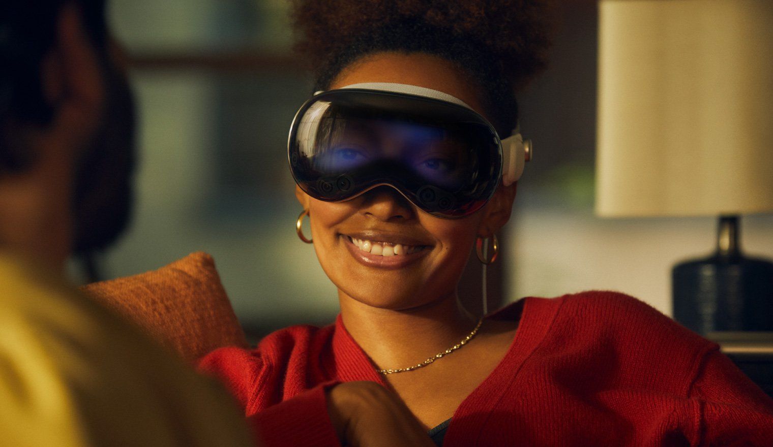 a woman wearing Apple Pro Vision Mixed Reality Headset
