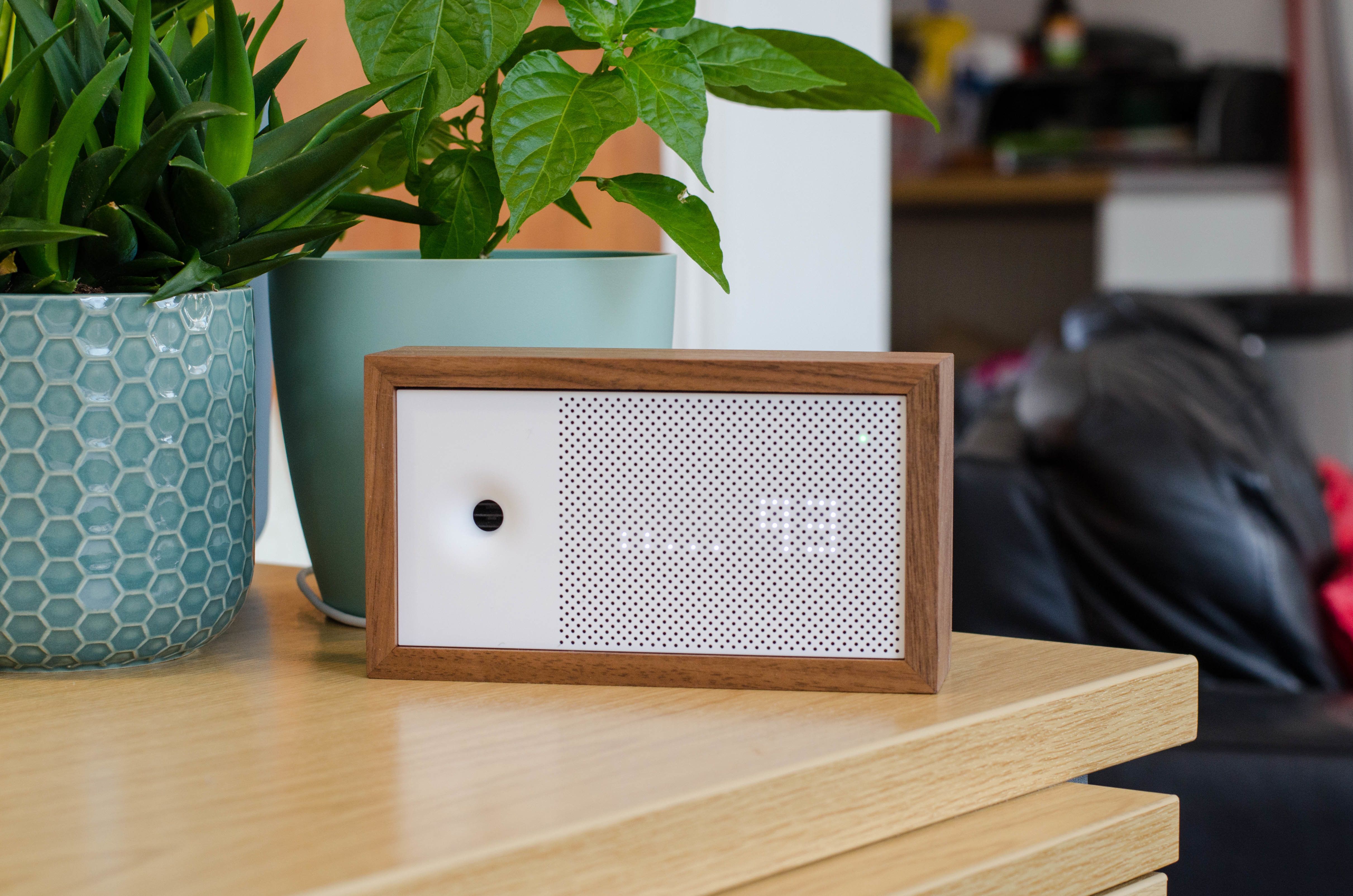 a photo of Awair Element Indoor Air Quality Monitor on an end table