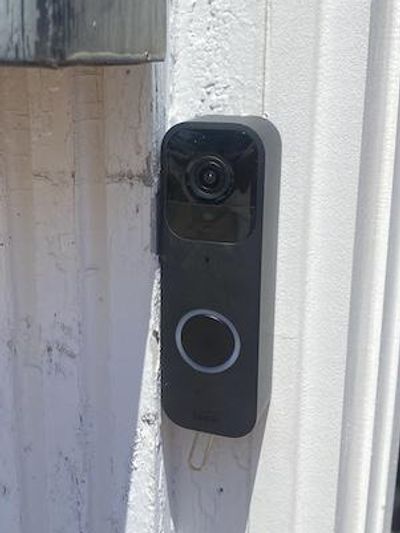 a photo of Blink Video Doorbell installed on a house