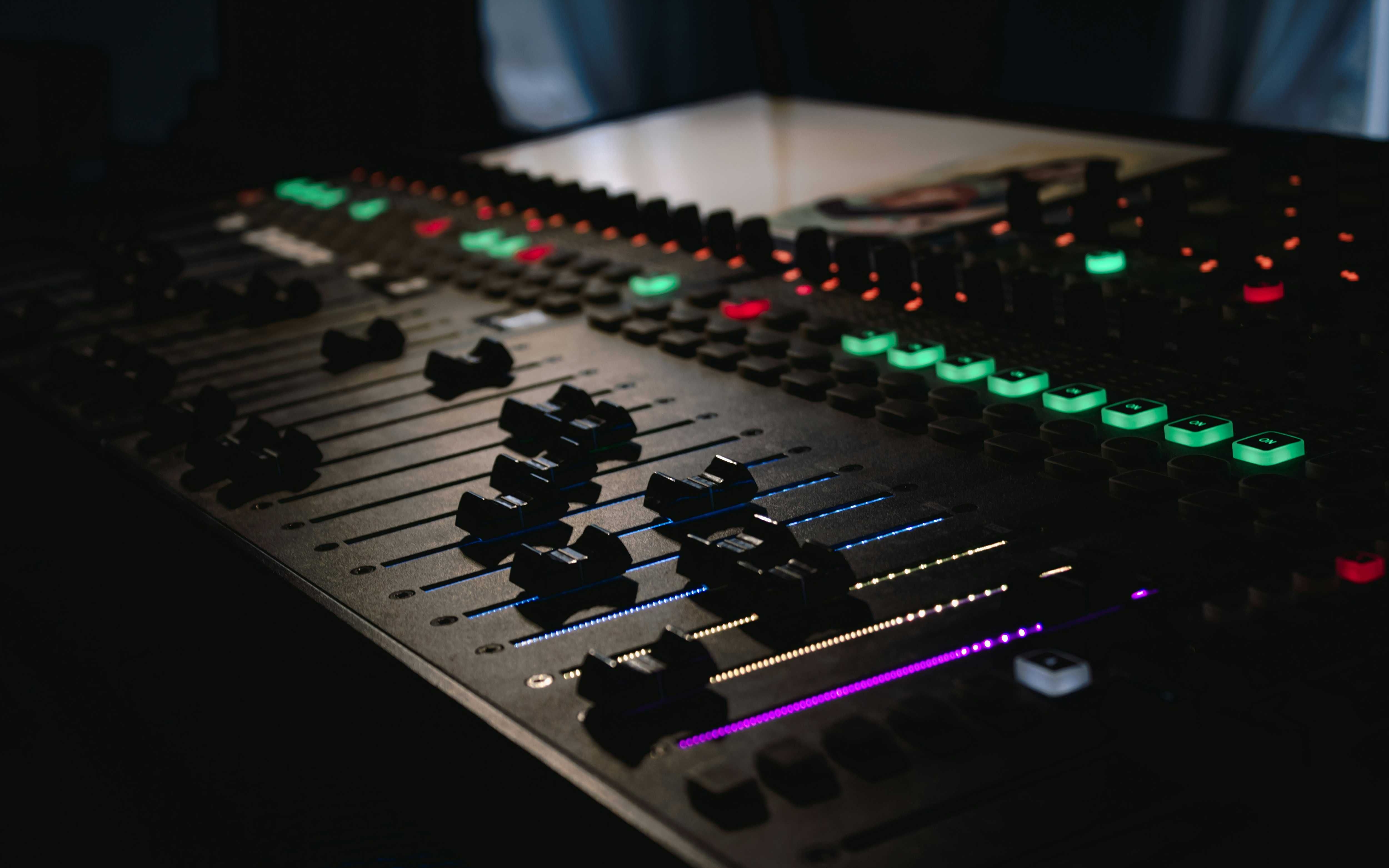 black and green audio mixer