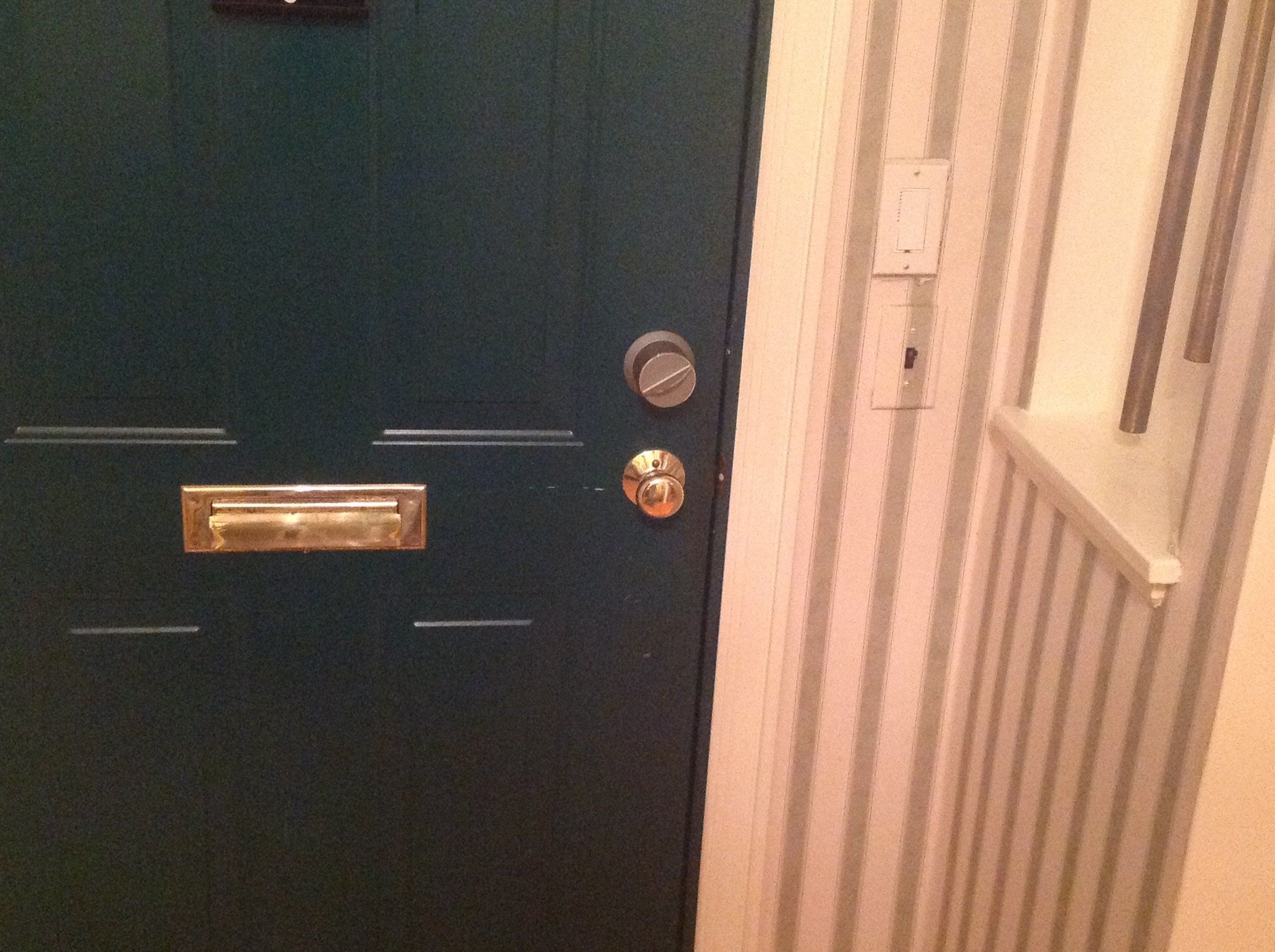 a photo of a door with Danalock V3 smart lock installed