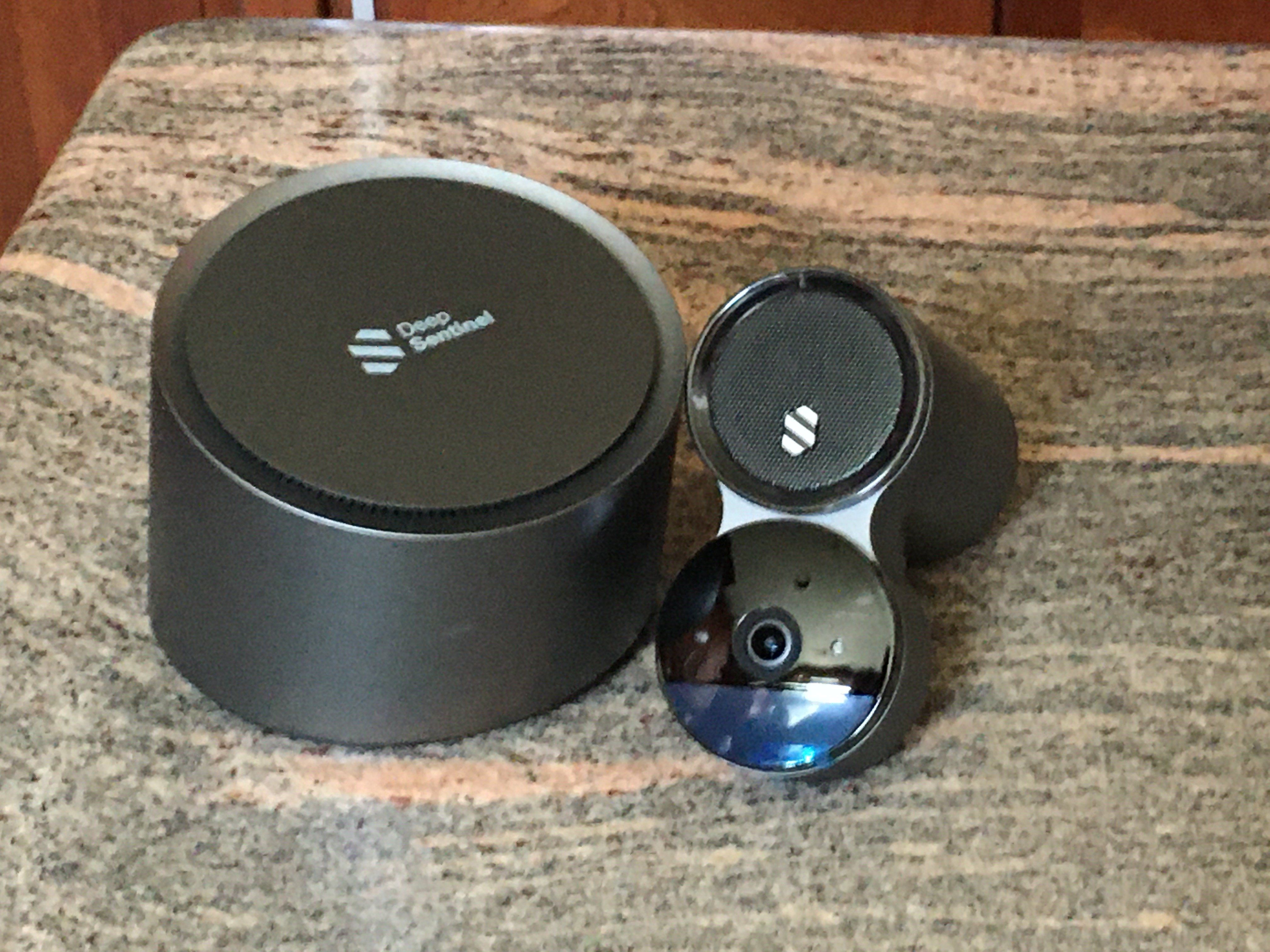 Deep Sentinel AI hub and Camera on a countertop