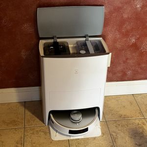 a photo of Ecovacs DEEBOT T20 OMNI Robot Vacuum and Mop installed in a kitchen