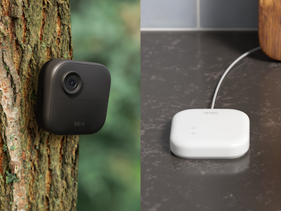 a photo of Blink Outdoor Camera 4 on a tree and new Blink Sync Module XR on a counter