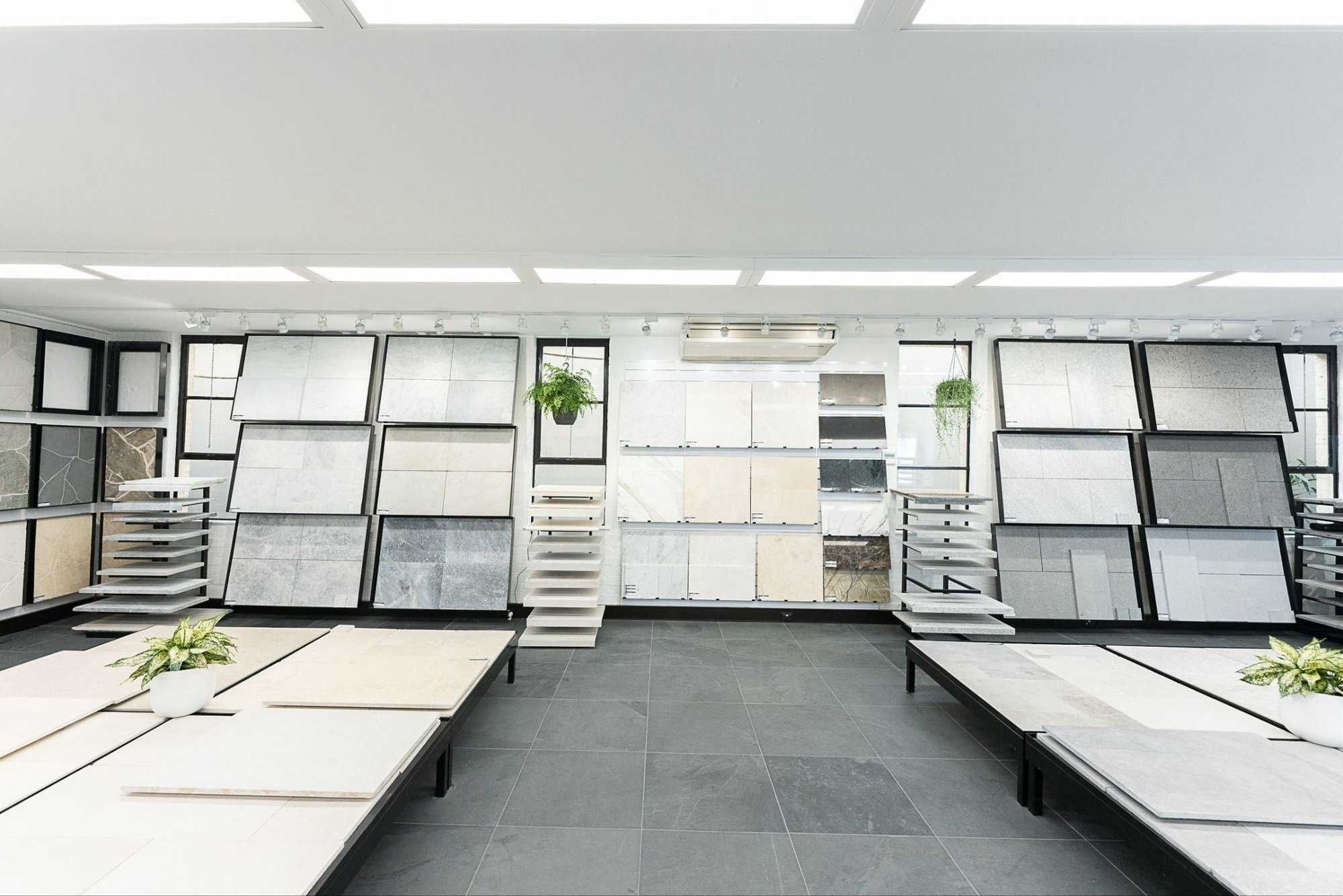 a photo of a bunch of slabs of limestone in a retail outlet