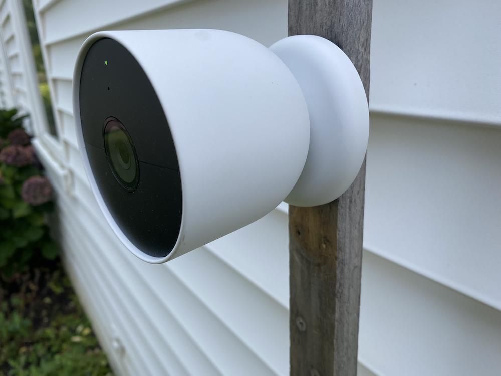 Google nest Cam installed outside on a house.