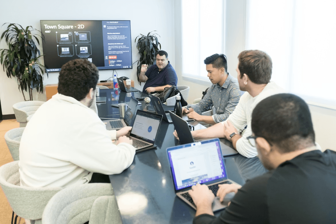 men sitting around a conference table