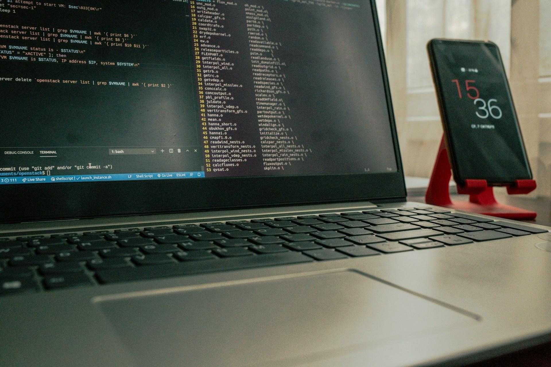 Photo of a laptop and smartphone