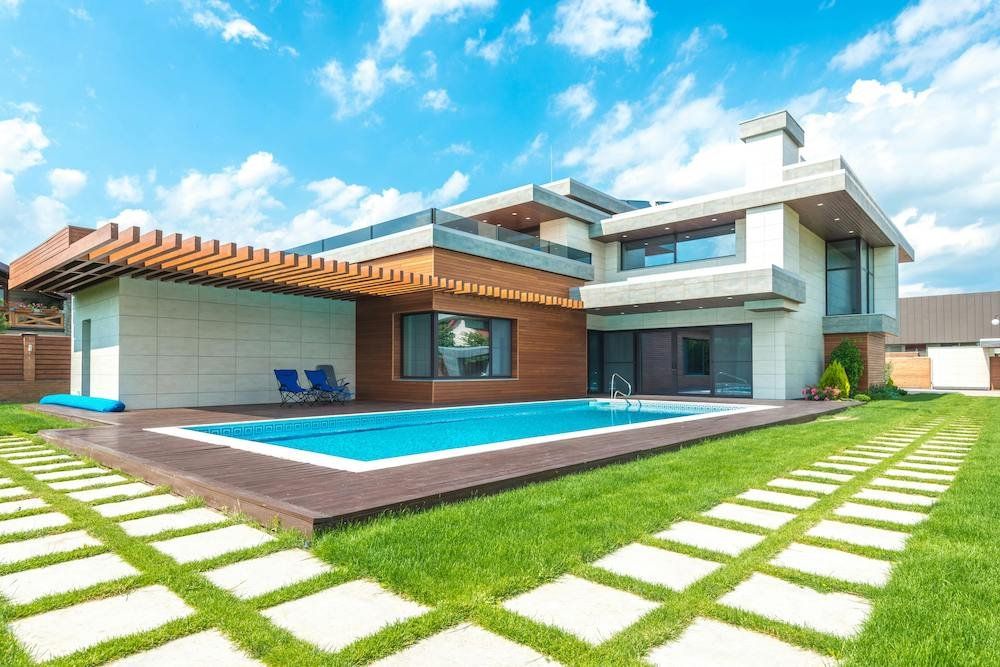 a photo of a house with a pool.`
