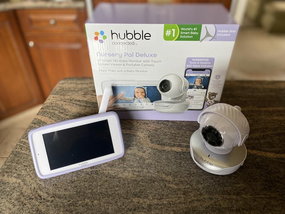Hubble Connected Nursery Pal Deluxe box, interactive display and camera on a countertop