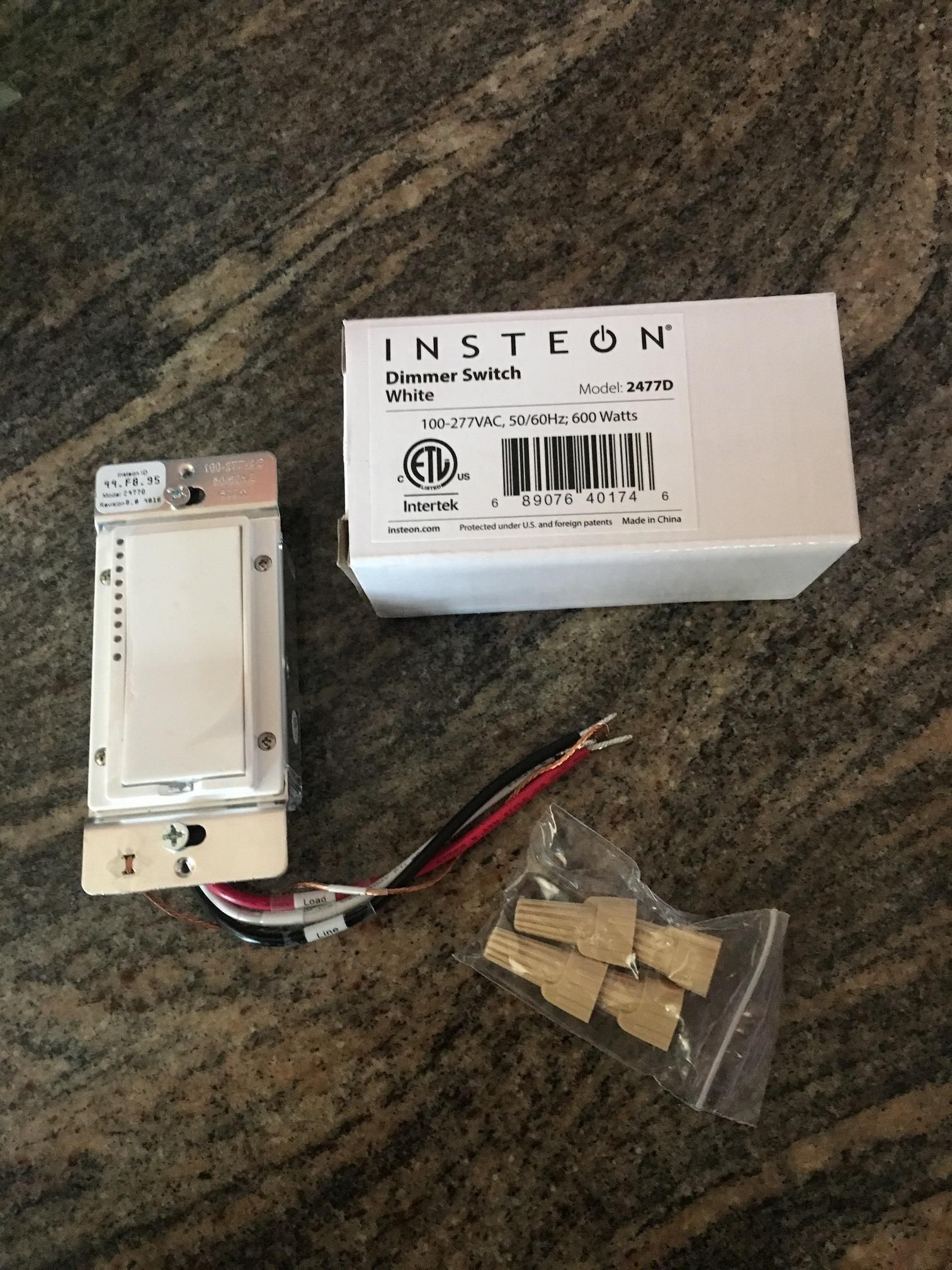 A Photo of Insteon Dimmer Switch on a countertop