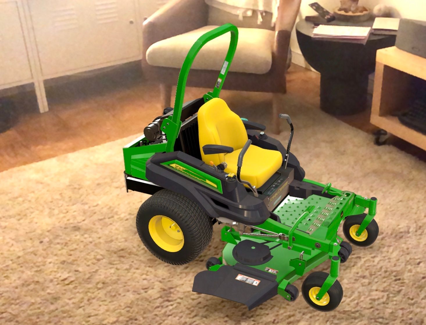 An image of a green and yellow John Deere lawn mower  in the middle of a living room