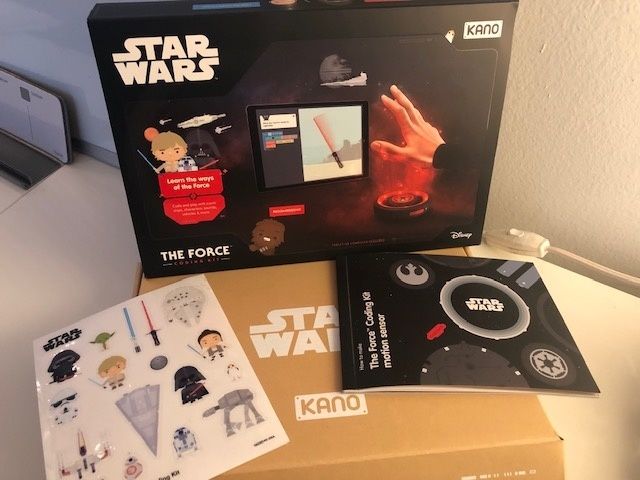 Stickers, the instruction manual and the box for the Kano Star Wars The Force Coding Kit