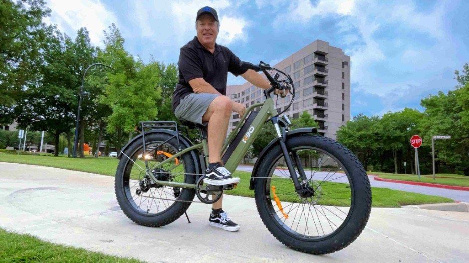 a photo of a man riding a KBO Tornado Electric Fat Tire Bike