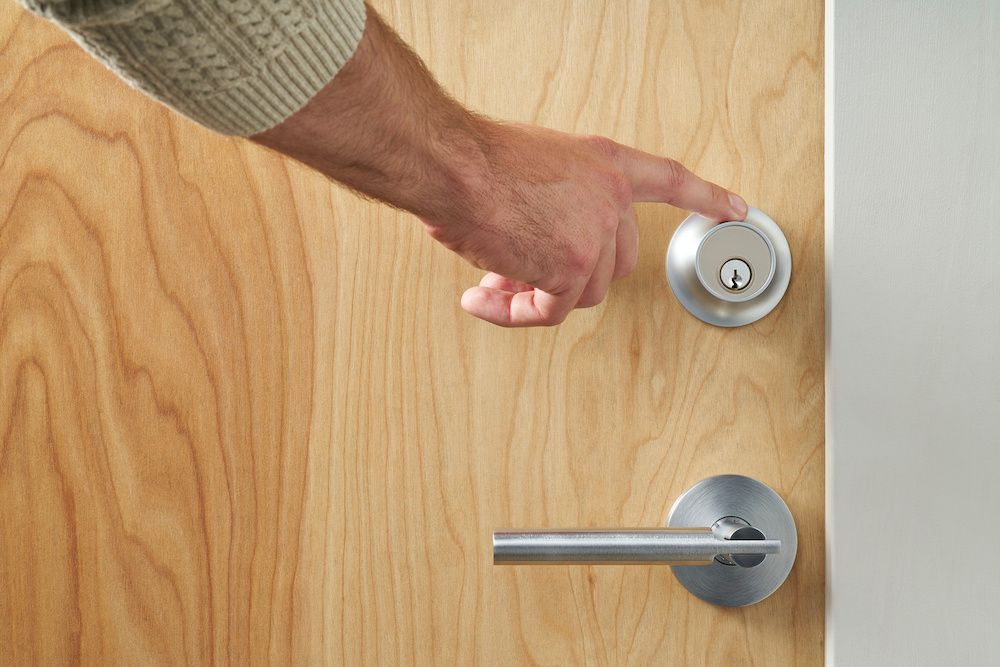 Level Touch Lock being unlocked by person touching lock with finger.