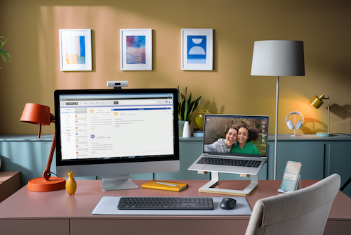 a photo of an office with Logitech Signature Slim MK950 Wireless Keyboard and Combo