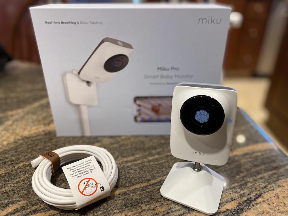 Miku Pro Smart Baby Monitor on a countertop, unboxed