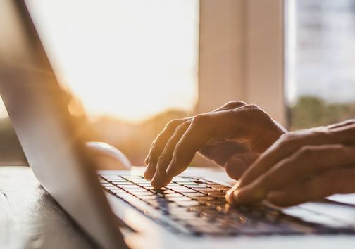 Person at a computer typing