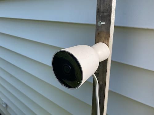 Nooie Outdoor smart security camera installed on a house