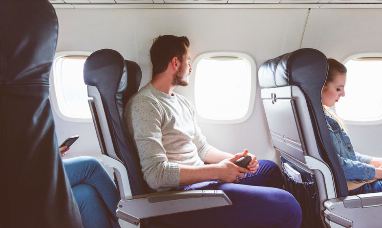 People seated on an airplane