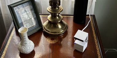 Psync Camera Genie S on an end table