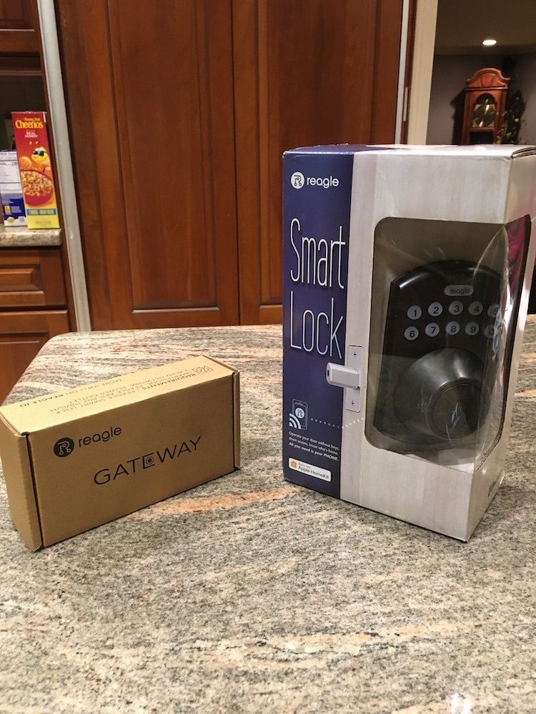 Reagle Smart Lock and Gateway on a counter.