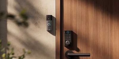 photo of Ring Smart Lock on a door next to a Ring Video Doorbell on the wall