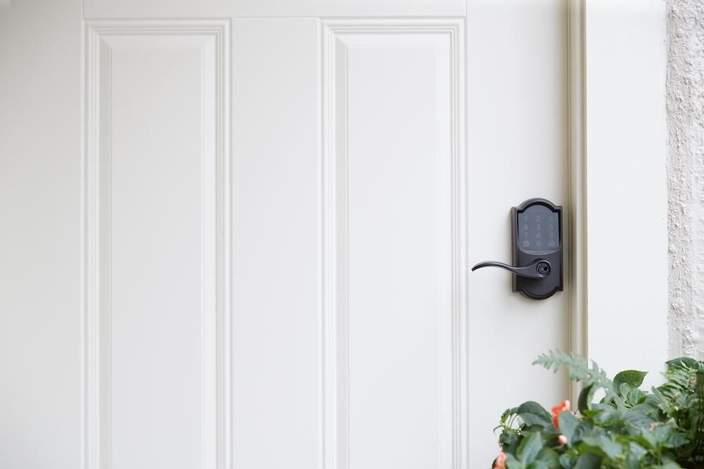 a photo of a front door with Schlage Encode Smart Wi-Fi Lever Lock