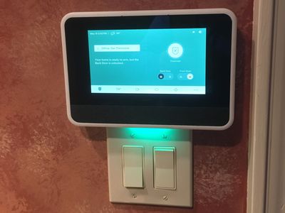 a photo of Vivint Smart Hub on a wall in a home.
