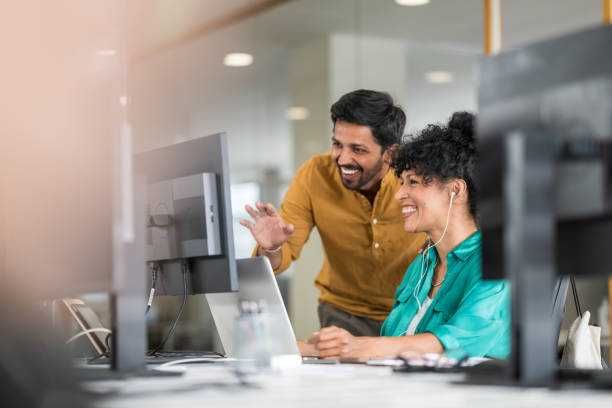 professionals greeting through conference call - office workers stock pictures, royalty-free photos & images
