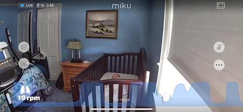 Photo of Miku app showing a baby sleeping with breathing being monitored on the app