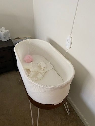 Photo of Snoo Smart Sleeper Bassinet in a bedroom