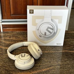 a photo of SoundPEATS Space Over-the-Ears ANC Headphones and box on a countertop.