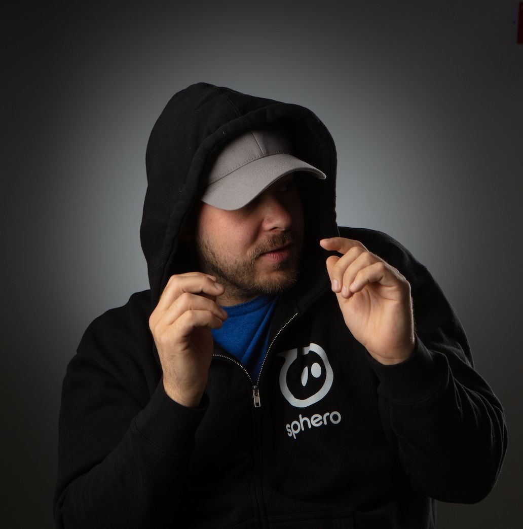 Sphero's founder Adam Wilson wearing a hoodie and a baseball cap