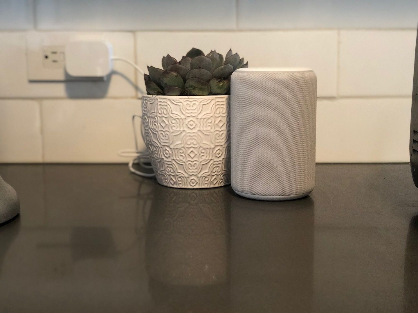 a photo of Amazon Echo Plus 2nd gen on a kitchen counter