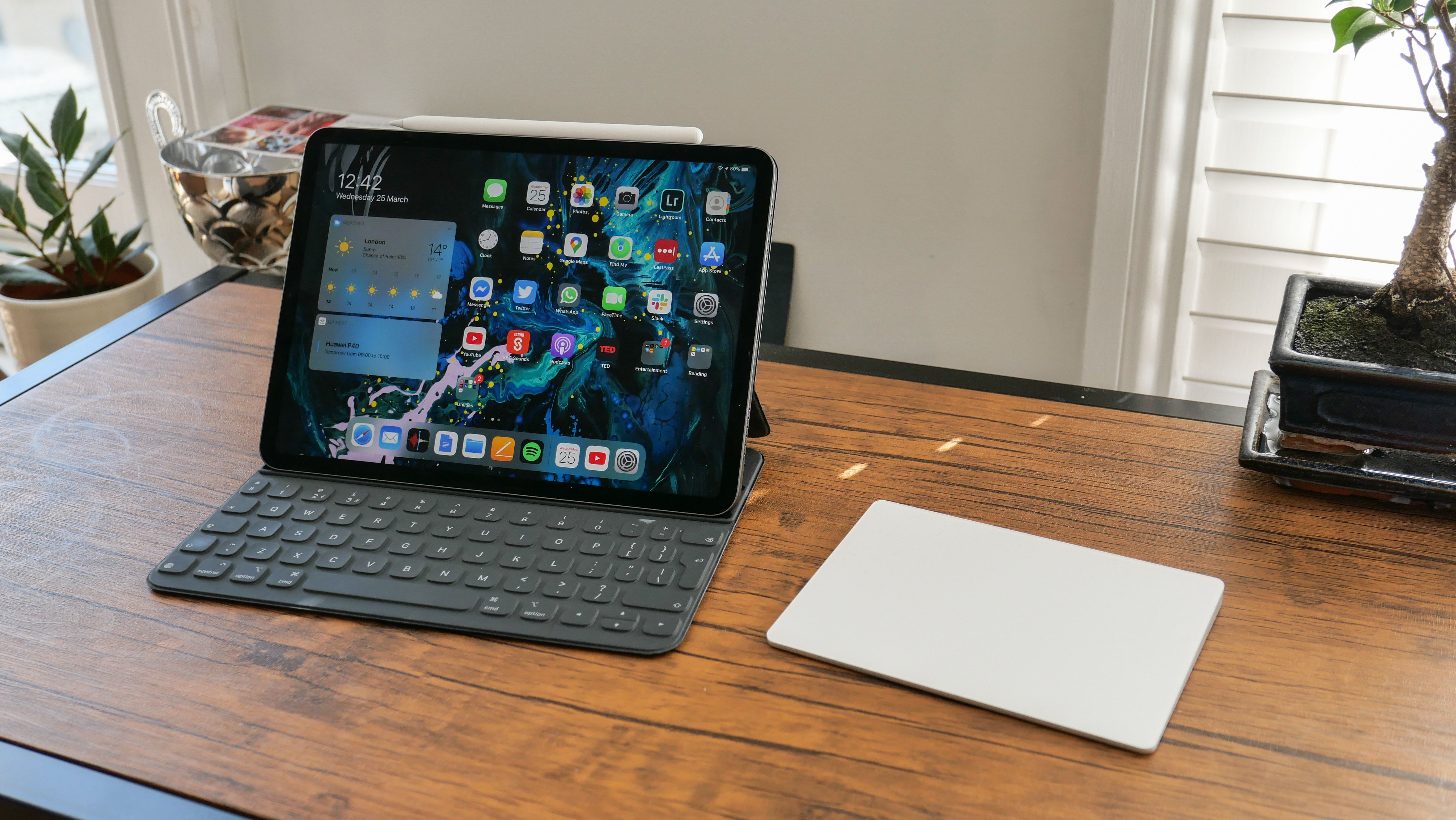 iPad with a keyboard, stylus and trackpad