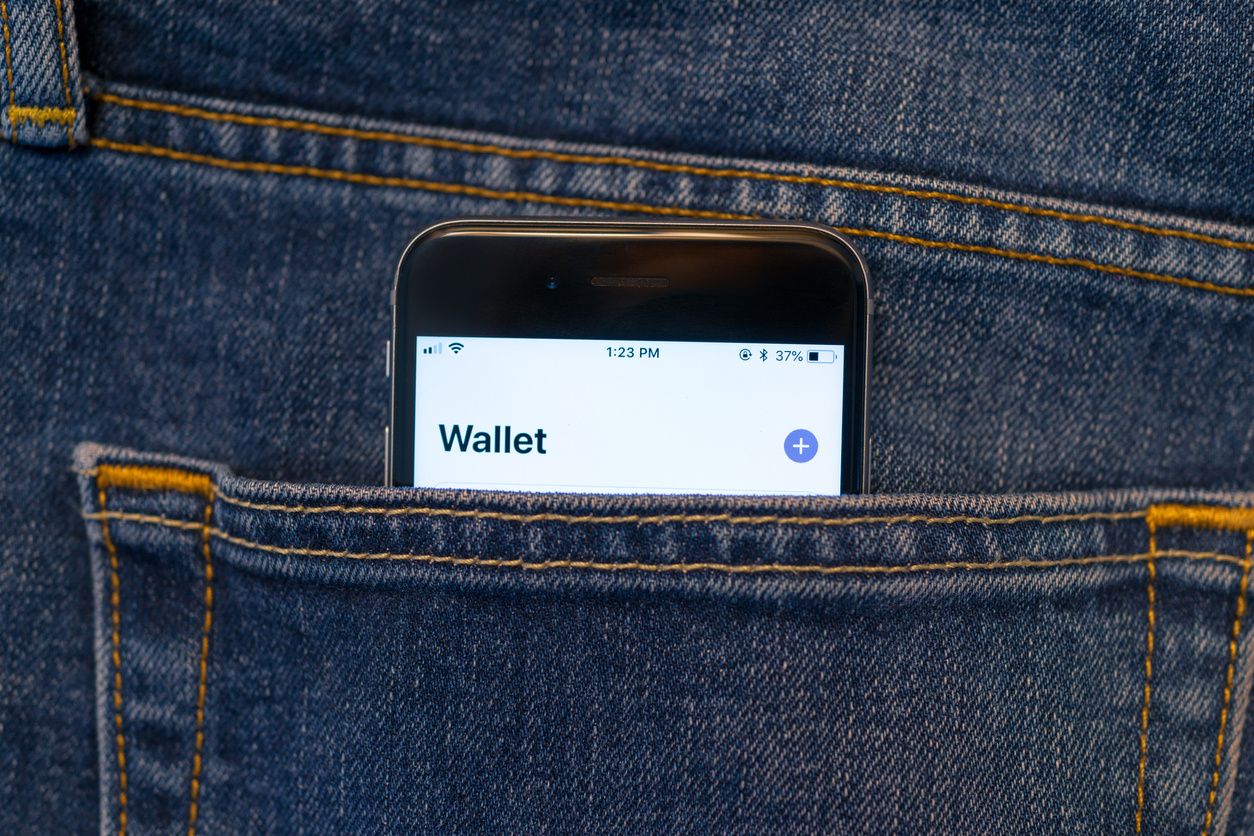 Photo of an iPhone being used as a wallet