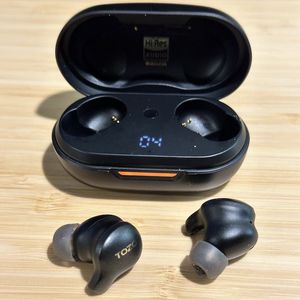 a photo of TOZO Golden X1 Wireless Earbuds with case opened