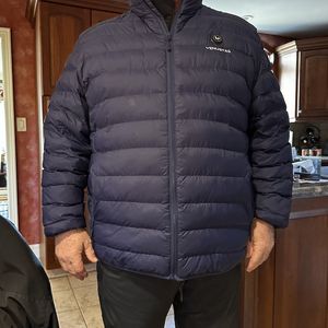 a photo of a male wearing a Venustas Men’s Heated Lightweight Puffer Jacket 7.4V
