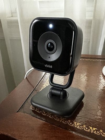 a photo of Vivint Indoor Camera Pro on an end table