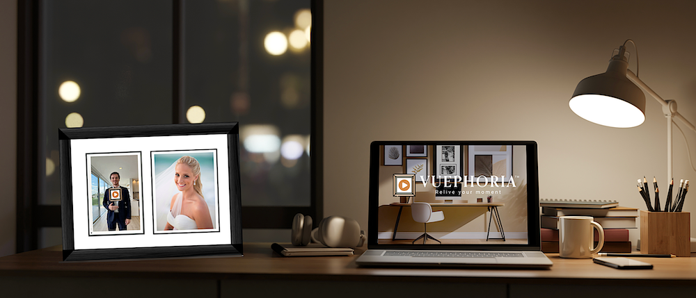 Photo of Vuephoria vFrame on a desk next to a laptop